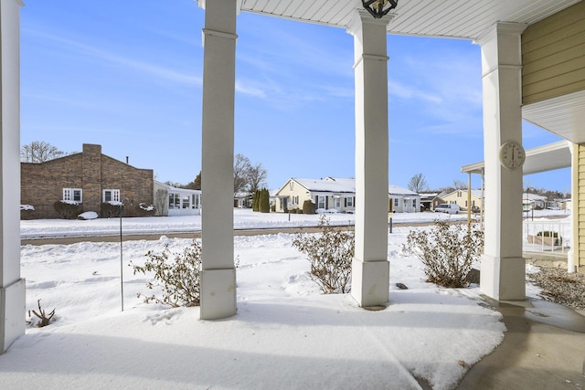 view of snow covered patio