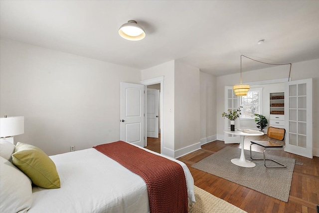 bedroom featuring dark hardwood / wood-style floors