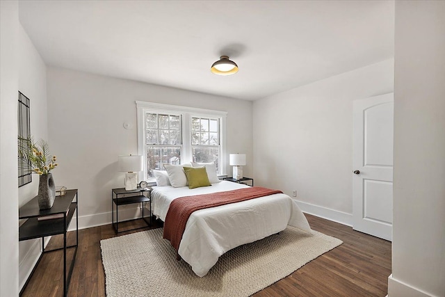 bedroom featuring dark hardwood / wood-style floors