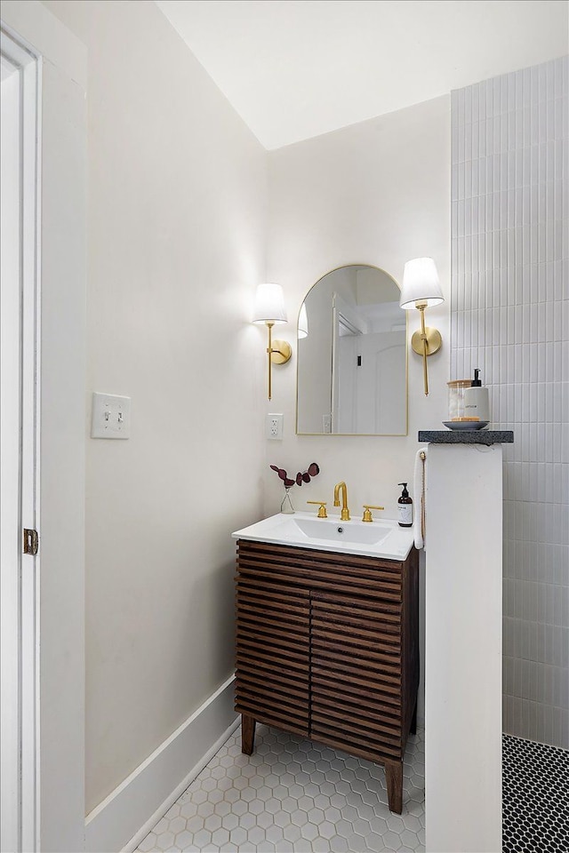 bathroom with vanity and tile patterned floors