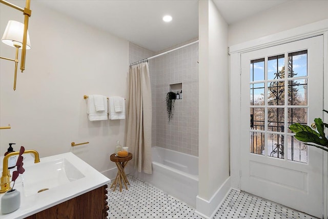 bathroom with vanity and shower / bath combo with shower curtain