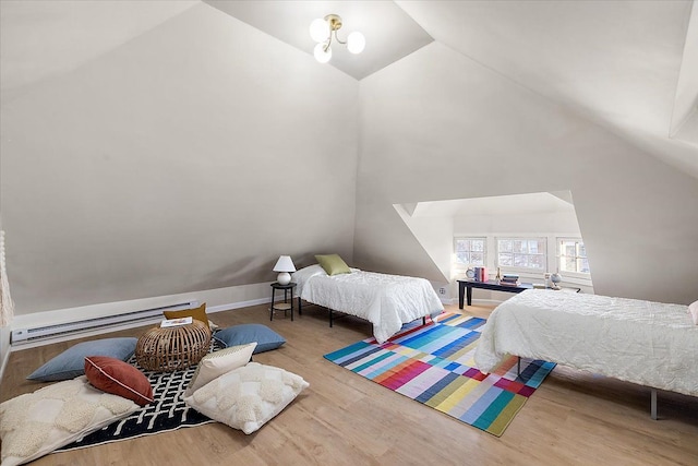 bedroom with wood-type flooring, high vaulted ceiling, and a baseboard radiator