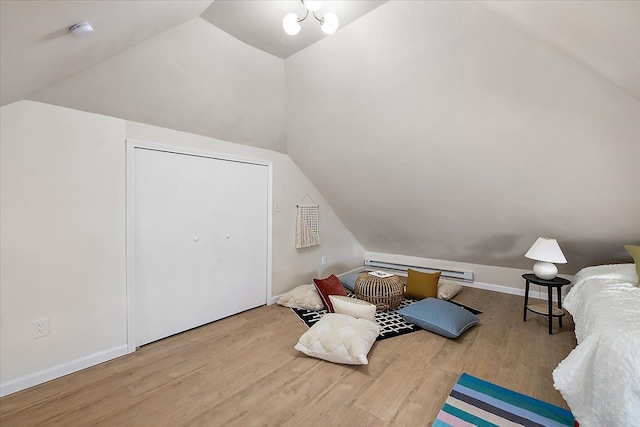 bonus room featuring vaulted ceiling and wood-type flooring