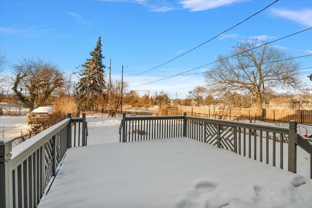 view of snow covered deck