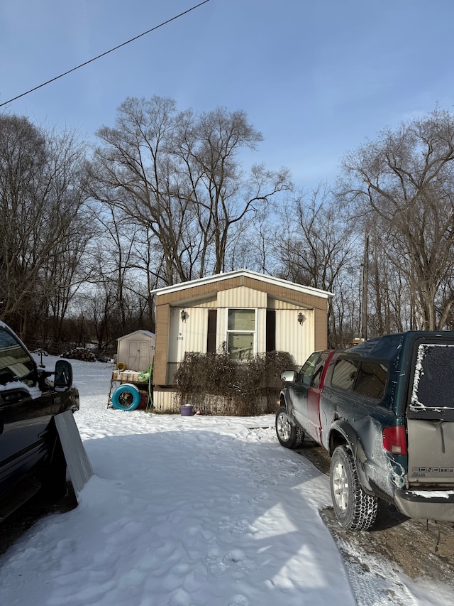 view of snow covered property