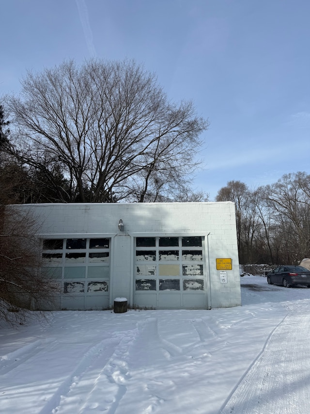 view of snow covered garage