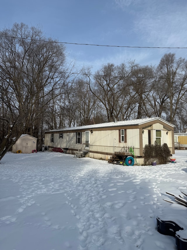 manufactured / mobile home with a shed