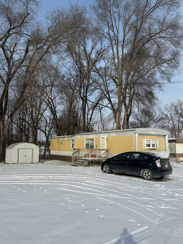 view of snow covered parking