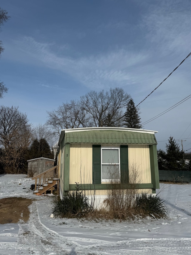 view of snow covered property