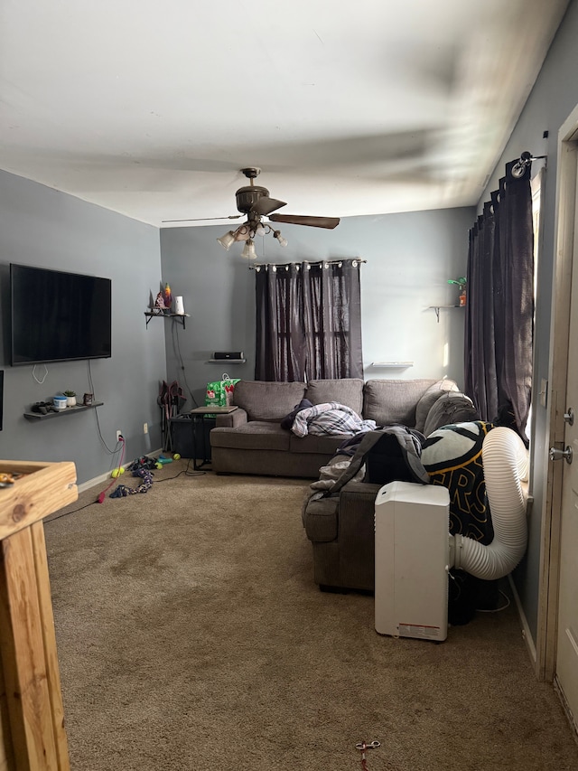 living room with carpet floors and ceiling fan