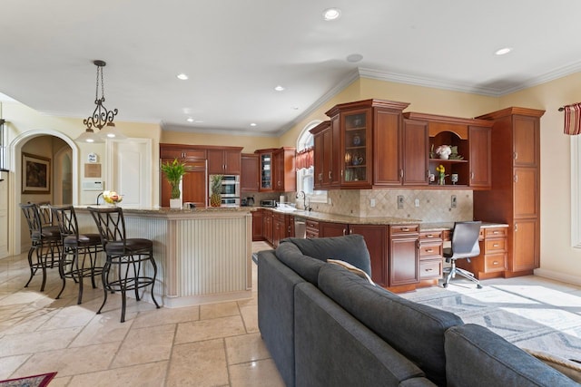 8557 Forestview Dr, Canton, MI 48187 - kitchen featuring open floor plan, a sink, recessed lighting, stainless steel appliances, and a breakfast bar