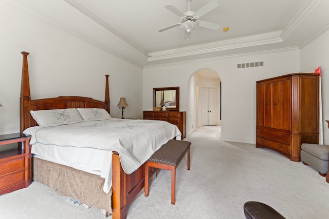 bedroom featuring light colored carpet and ceiling fan