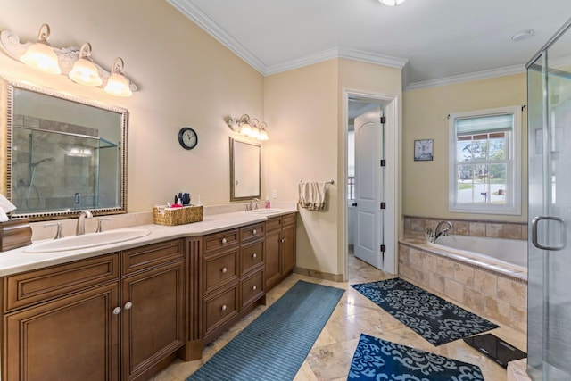 bathroom with vanity, crown molding, and separate shower and tub