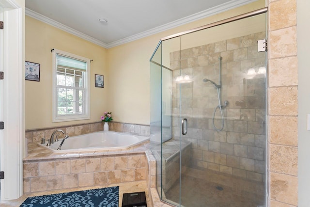 bathroom with ornamental molding and plus walk in shower