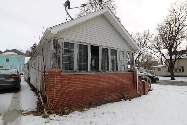 view of snow covered property