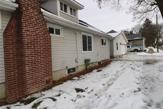 view of snow covered property