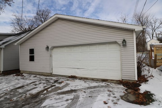 view of snow covered garage