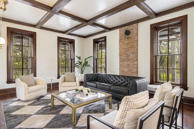 living room with coffered ceiling, dark hardwood / wood-style flooring, and beam ceiling