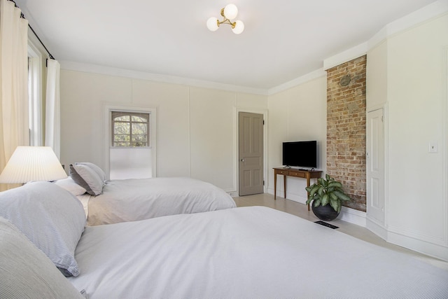 bedroom featuring crown molding