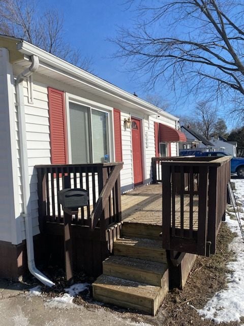 view of snow covered deck