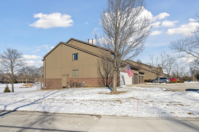 view of snow covered property