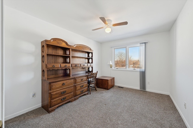 miscellaneous room with ceiling fan and carpet