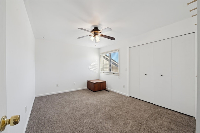 unfurnished bedroom with carpet, ceiling fan, and a closet