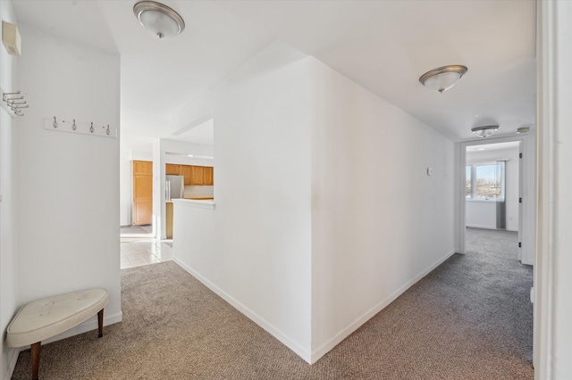 corridor featuring carpet flooring