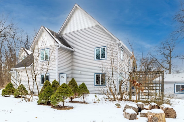 view of snow covered property