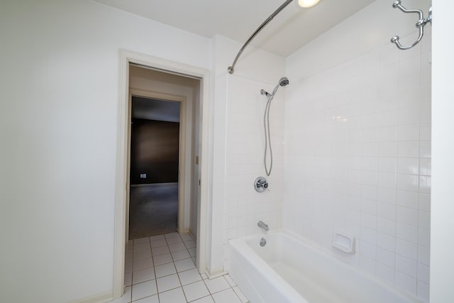 bathroom featuring tile patterned floors and tiled shower / bath combo