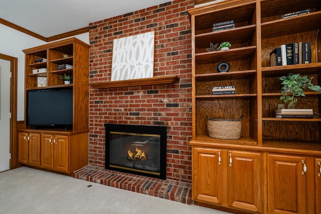 carpeted living room with ornamental molding and a brick fireplace