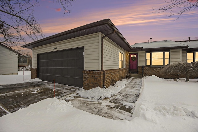 ranch-style house with a garage