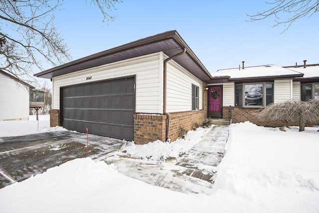 view of front of home with a garage