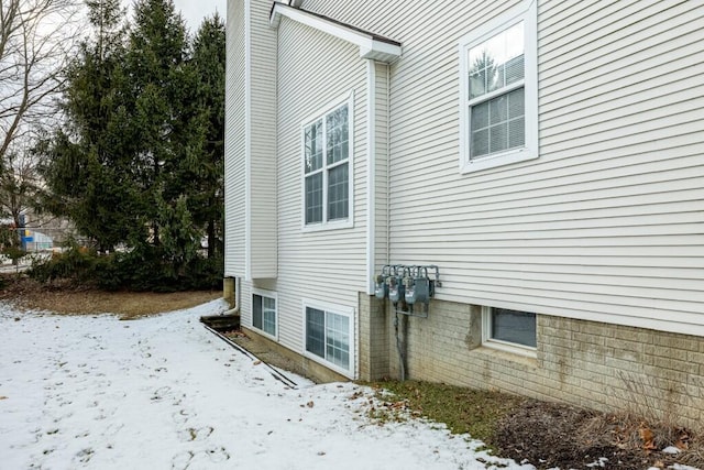 view of snow covered property