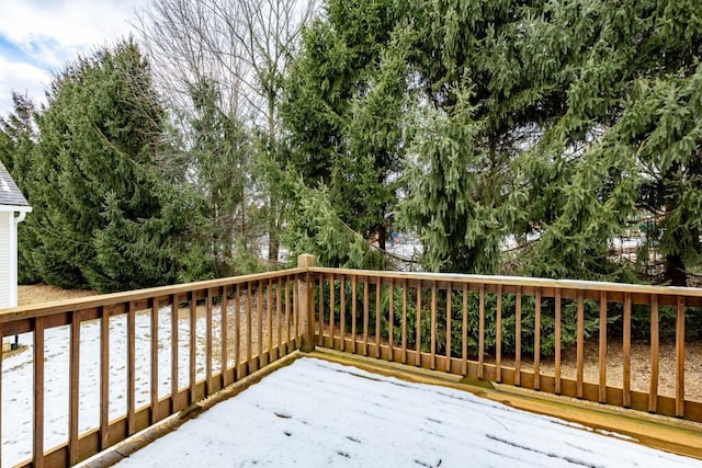 view of snow covered deck