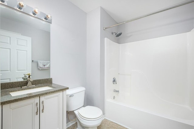 full bathroom featuring vanity, tub / shower combination, and toilet