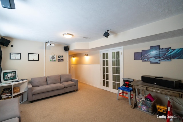 living room with french doors, light carpet, and a textured ceiling