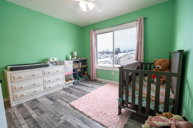 bedroom featuring ceiling fan and light hardwood / wood-style flooring