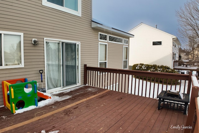 view of snow covered deck