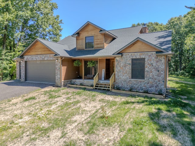 view of front facade featuring a garage and a porch