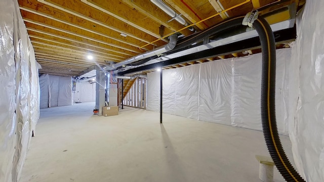 basement featuring heating unit