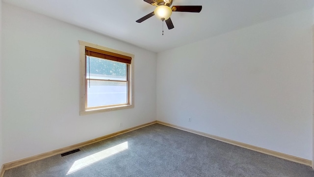 empty room with carpet and ceiling fan