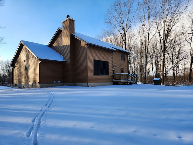 view of snow covered property