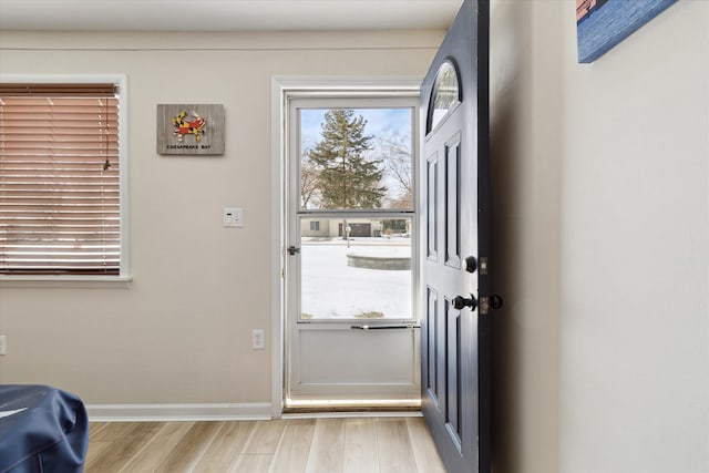 doorway to outside featuring light hardwood / wood-style floors