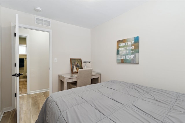 bedroom featuring light hardwood / wood-style floors