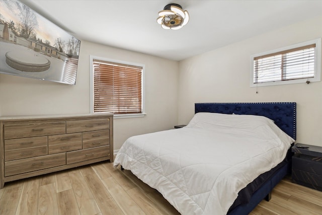 bedroom with light wood-type flooring