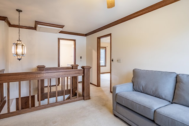 living room featuring light carpet, baseboards, and crown molding