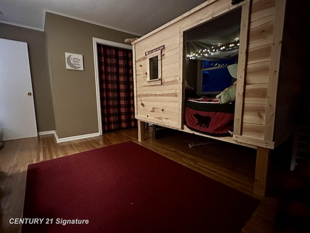 unfurnished bedroom featuring wood-type flooring