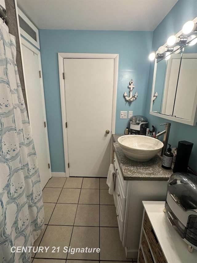 bathroom featuring vanity and tile patterned floors