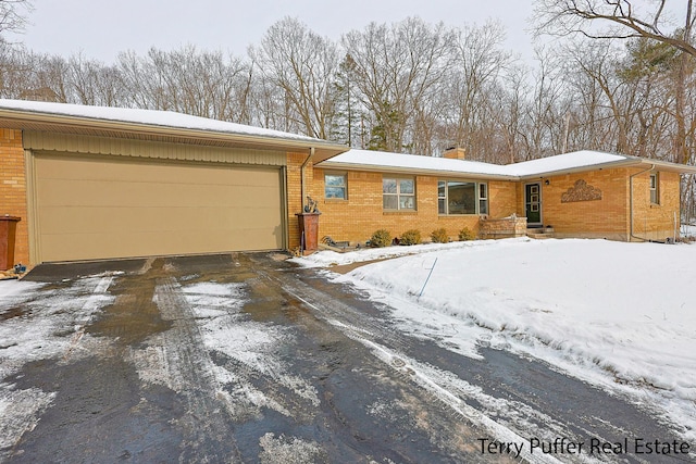 single story home with a garage